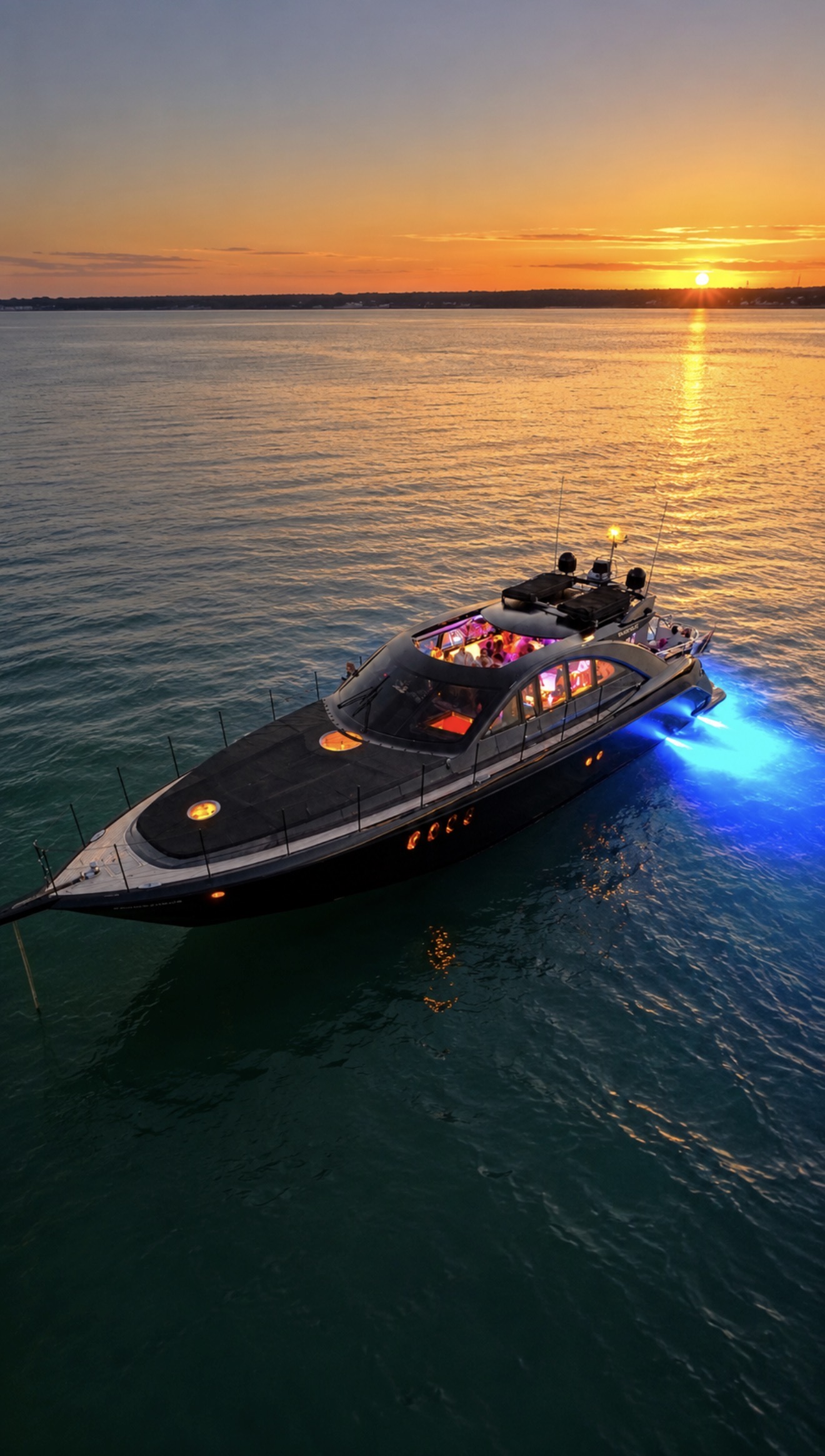Luxury yacht at sunset on Sydney Harbour